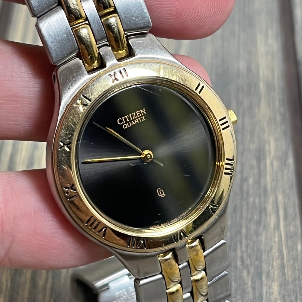 Citizen Quartz Watch Women Silver Gold Two Tone Roman Numeral Black Dial Dress